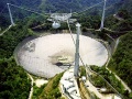 Arecibo Observatory = the main collecting dish is 305 m in diameter.jpg